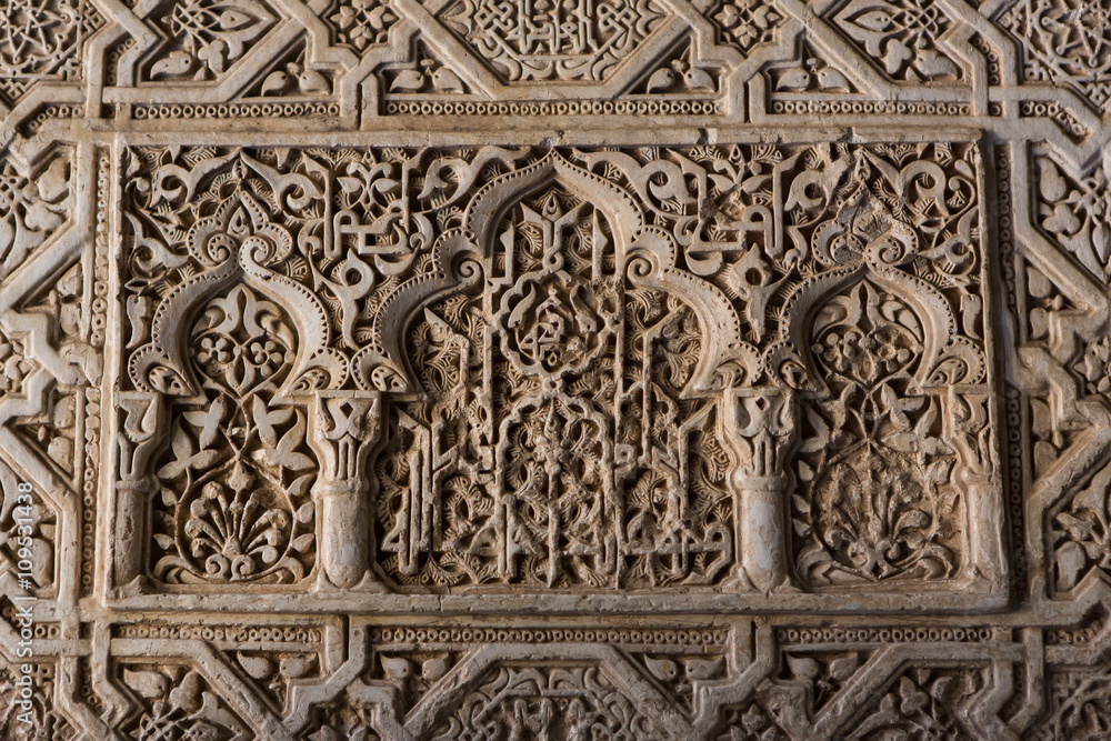Detail of a 800 years old wall in arabic style. Alhambra, Granada. South of Spain