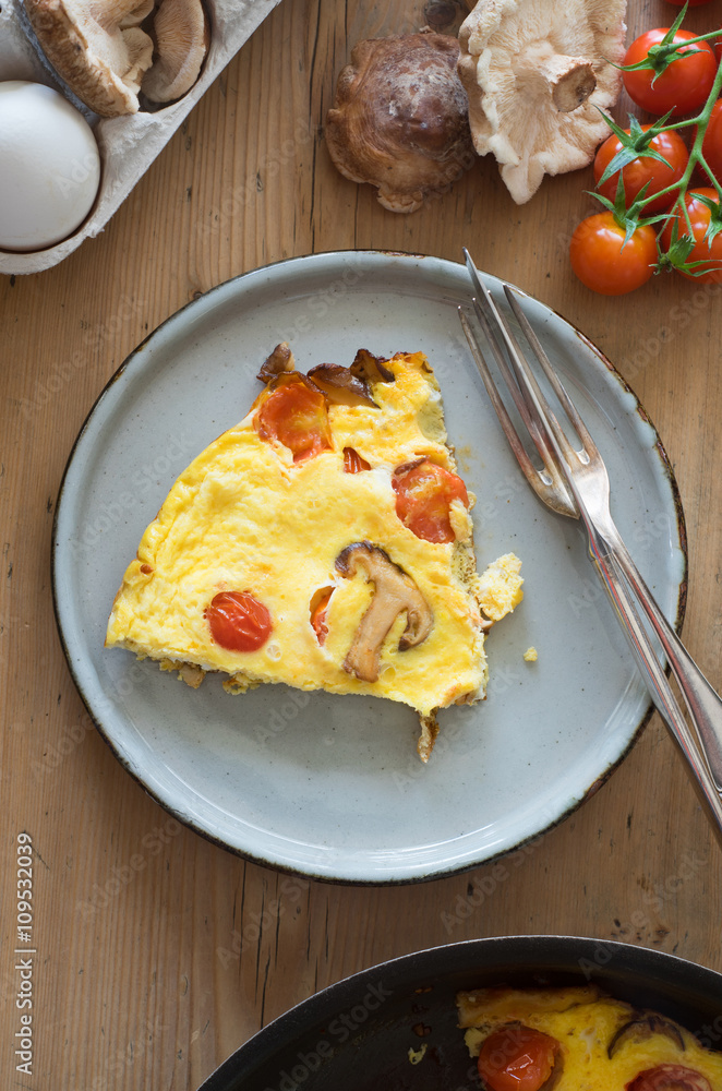 Frittata with cherry tomatoes and shiitake mushrooms Frittata with cherry tomatoes and shiitake mushrooms