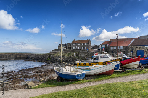 Craster harbour a small fishing port on the Northumberland coast in England photo