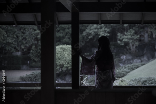 asian woman wearing traditional Japanese Kimono with rain © Oran Tantapakul