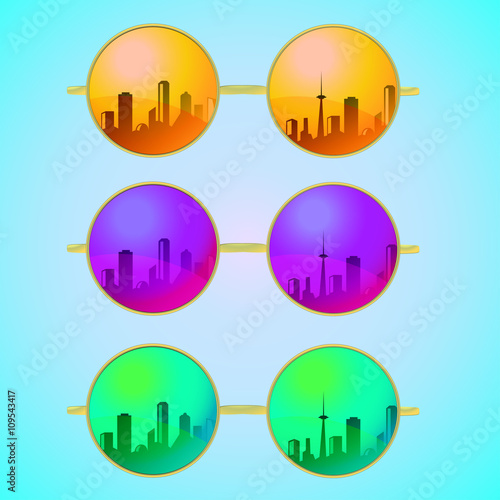 Trendy, round and vintage sunglasses with colorful lens and metal frame reflect city sky view in summer