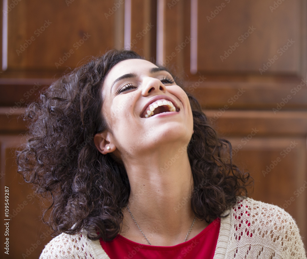 © Connect Images - Young woman with head back laughing © Connect Images - Young woman with head back laughing