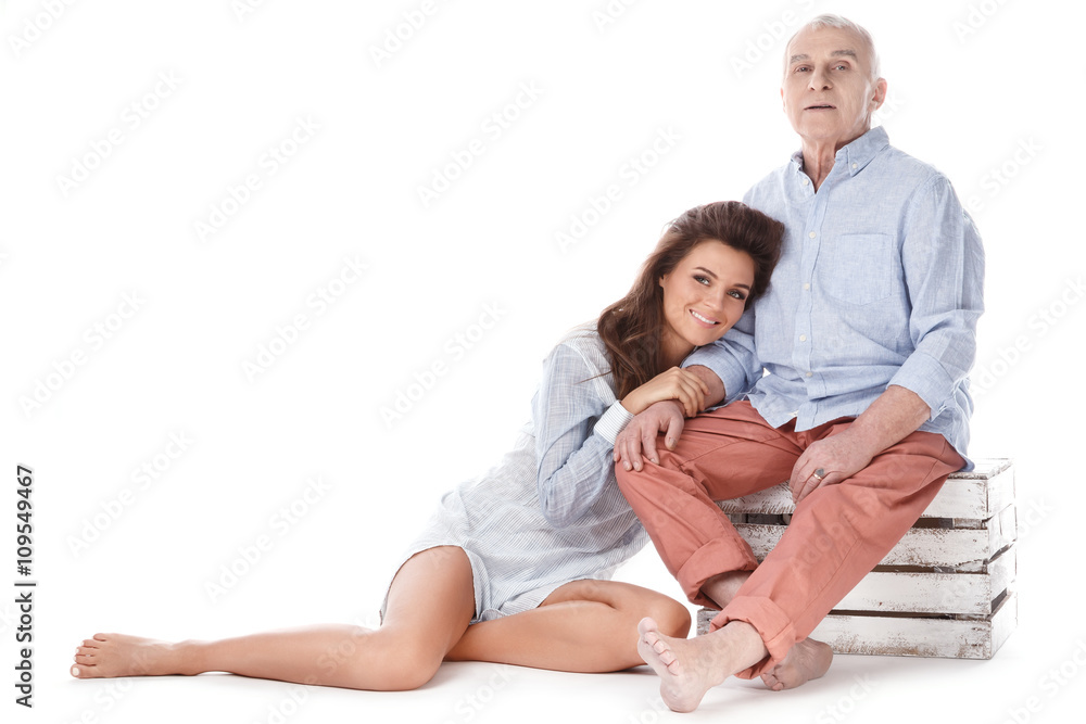 A Happy elderly man and his beautiful daughter A Happy elderly man and his beautiful daughter
