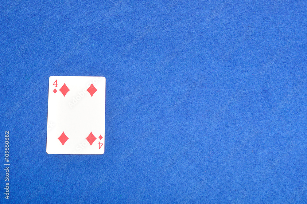 Playing card. Four of diamonds isolated on a blue background