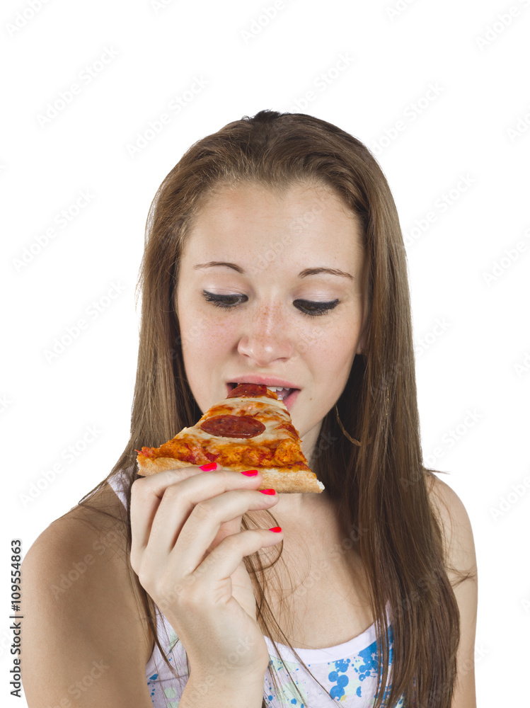 close-up of a teenage girl eating pizza.