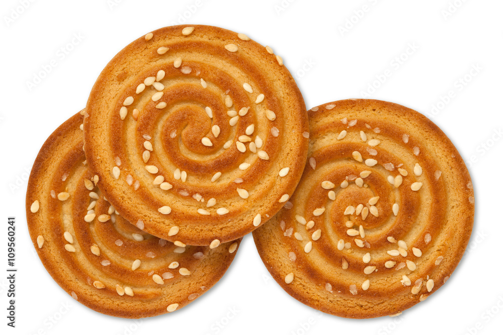 Fototapeta premium Top view cookies with sesame seeds isolated on white background