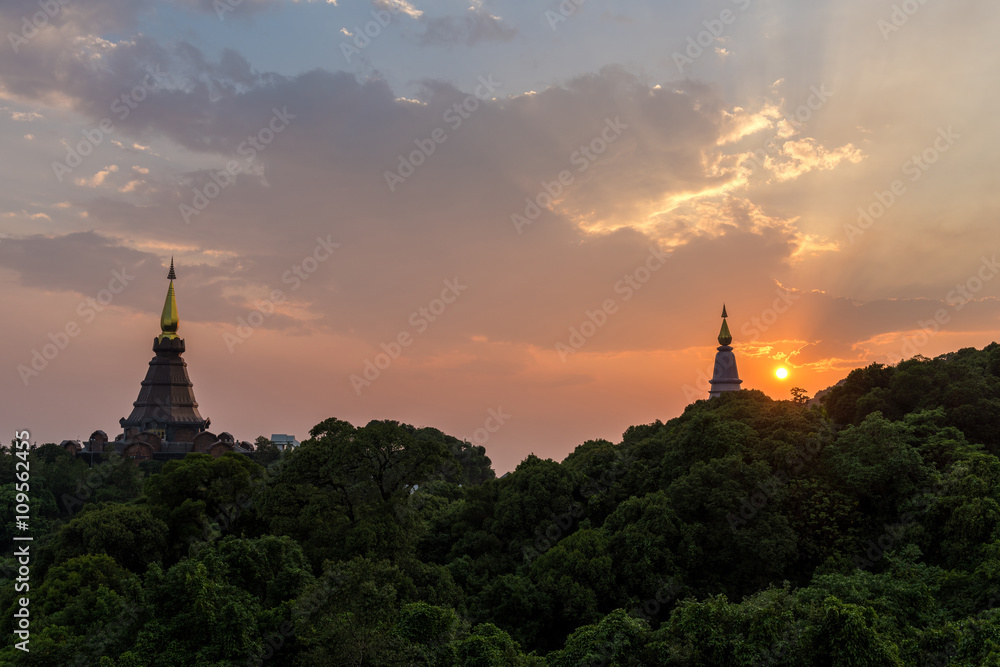 scene of a sunset at two pagoda on the top of Inthanon mountain,