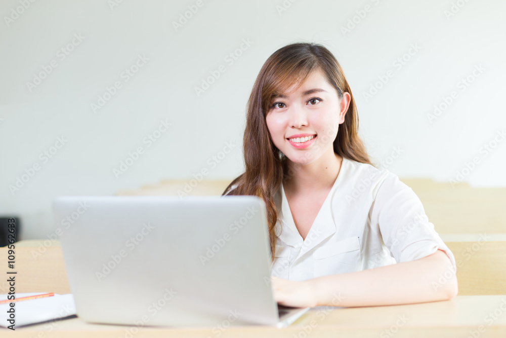 young beautiful asian girl student in classroom young beautiful asian girl student in classroom