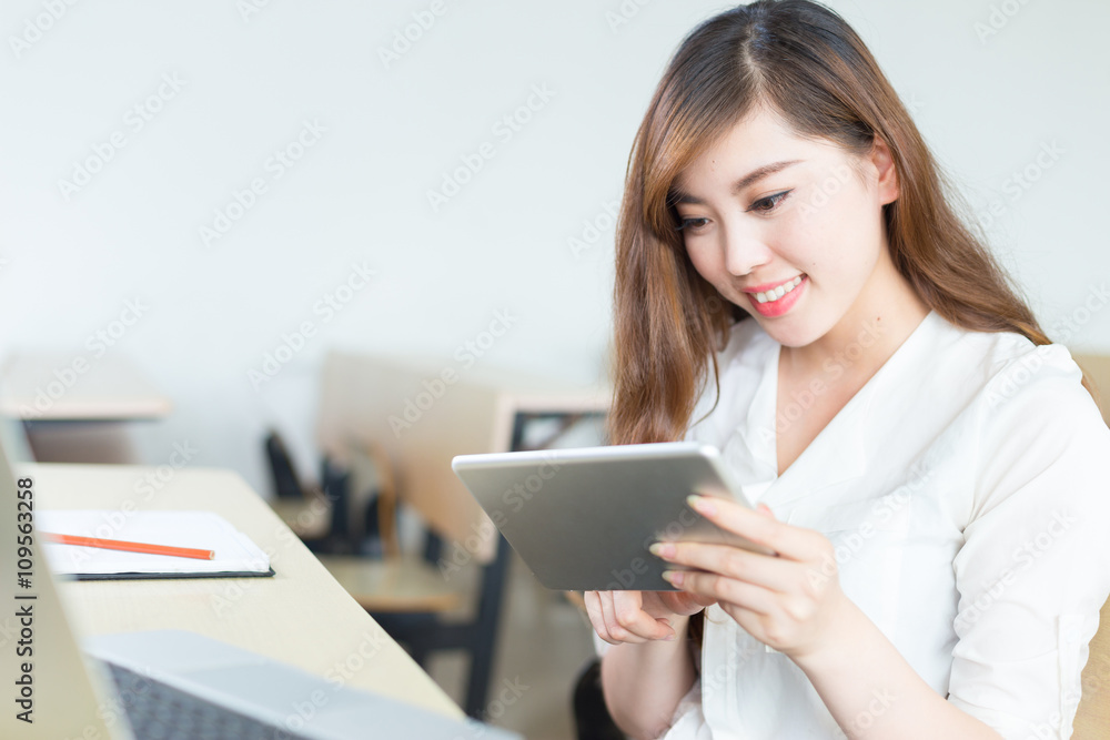 young beautiful asian girl student in classroom young beautiful asian girl student in classroom