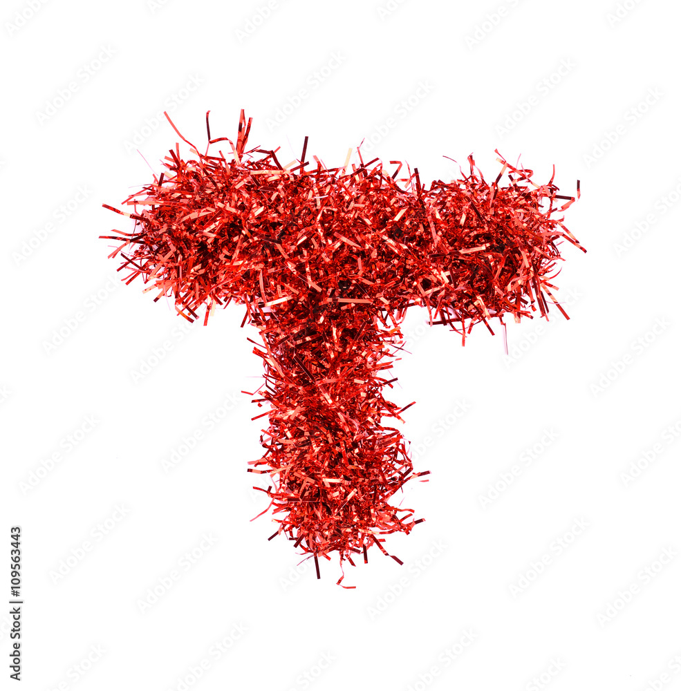 Fototapeta premium Tinsel Christmas decoration in form of T. On a white background