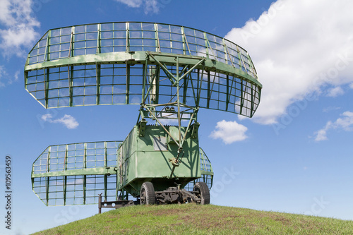 military equipment radio radars in blue sky.