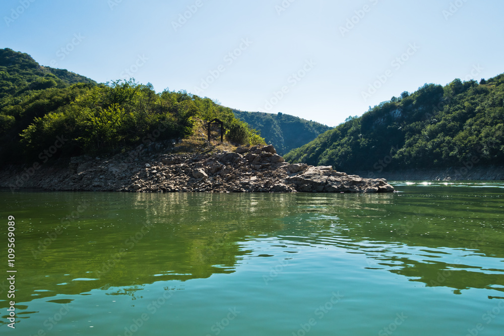 Rocky landscape of river Uvac gorge at sunny summer morning, southwest Serbia Rocky landscape of river Uvac gorge at sunny summer morning, southwest Serbia