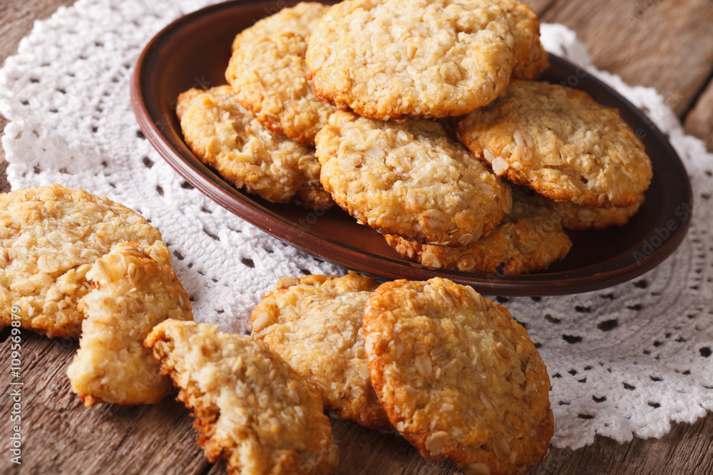 Australian ANZAC biscuits close up on a plate. horizontal
Australian ANZAC biscuits close up on a plate. horizontal