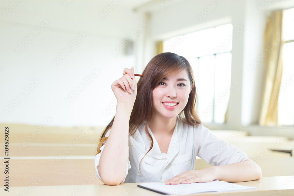 young beautiful asian girl student in classroom young beautiful asian girl student in classroom