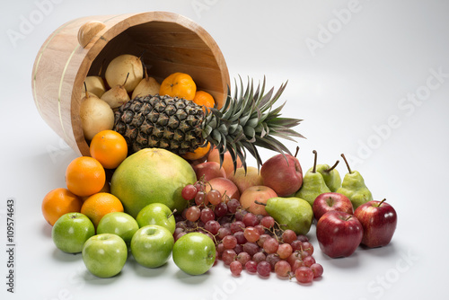 bucket with tropical fruits