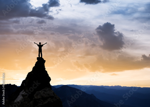 man on the top of a rock
