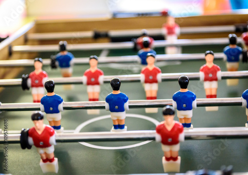 Close up of foosball Table Soccer Game match figures.