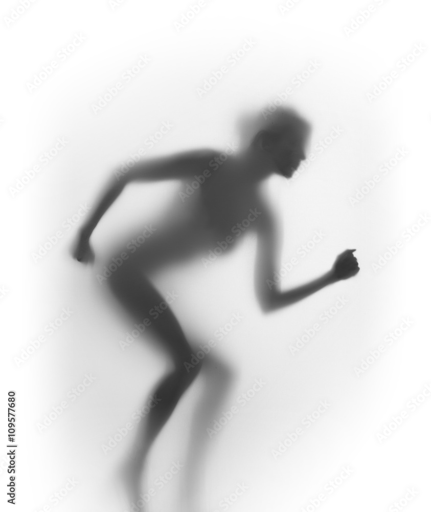 Silhouette of a preparing female runner