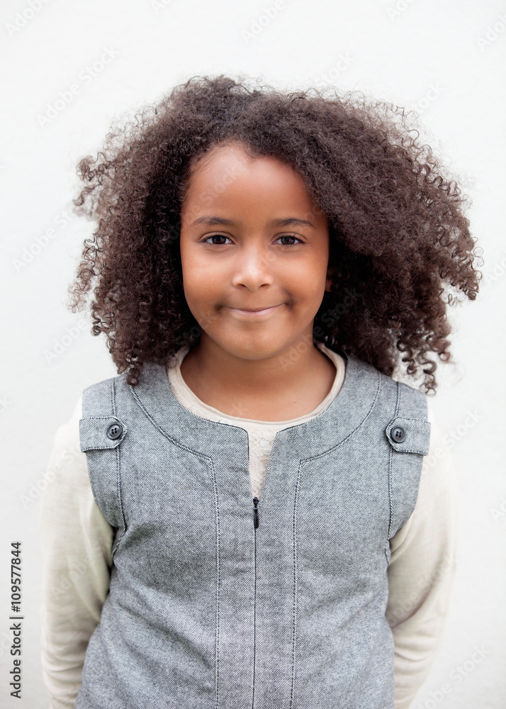 Obraz premium Pretty girl eight years old with beautiful hair
