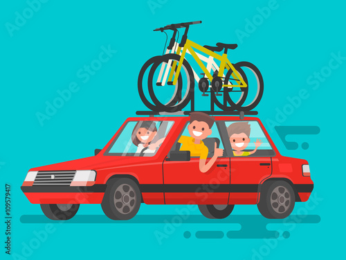 Happy family riding in a car. Bicycle trip