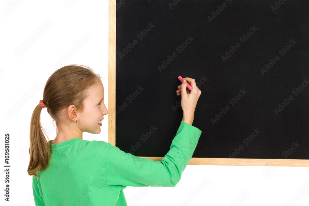 Young Girl Writing On A Blackboard Young Girl Writing On A Blackboard