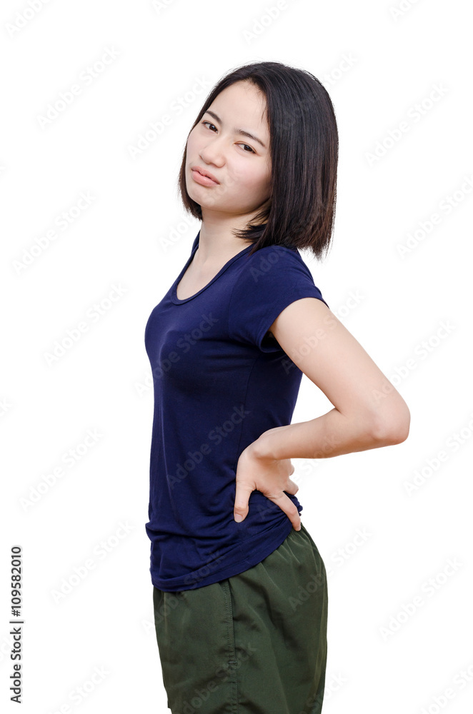 Young Asian girl having back pain isolated over white Young Asian girl having back pain isolated over white