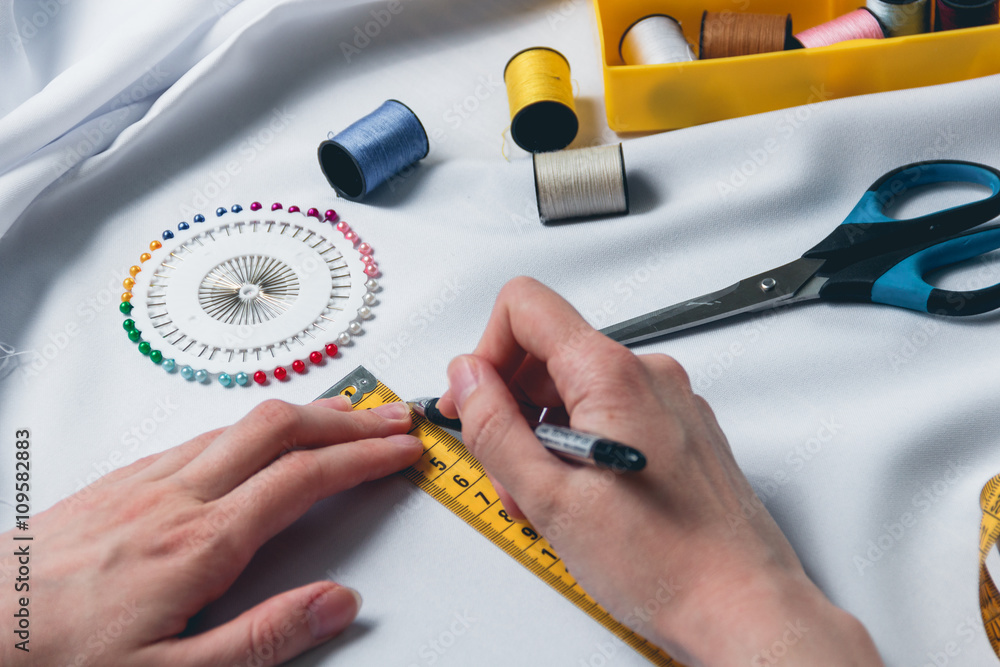 beautiful young woman tailor measuring beautiful young woman tailor measuring