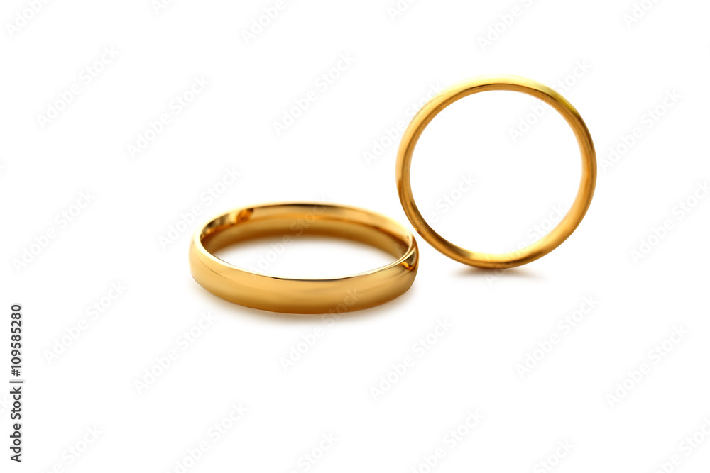 Golden wedding rings isolated on a white Golden wedding rings isolated on a white