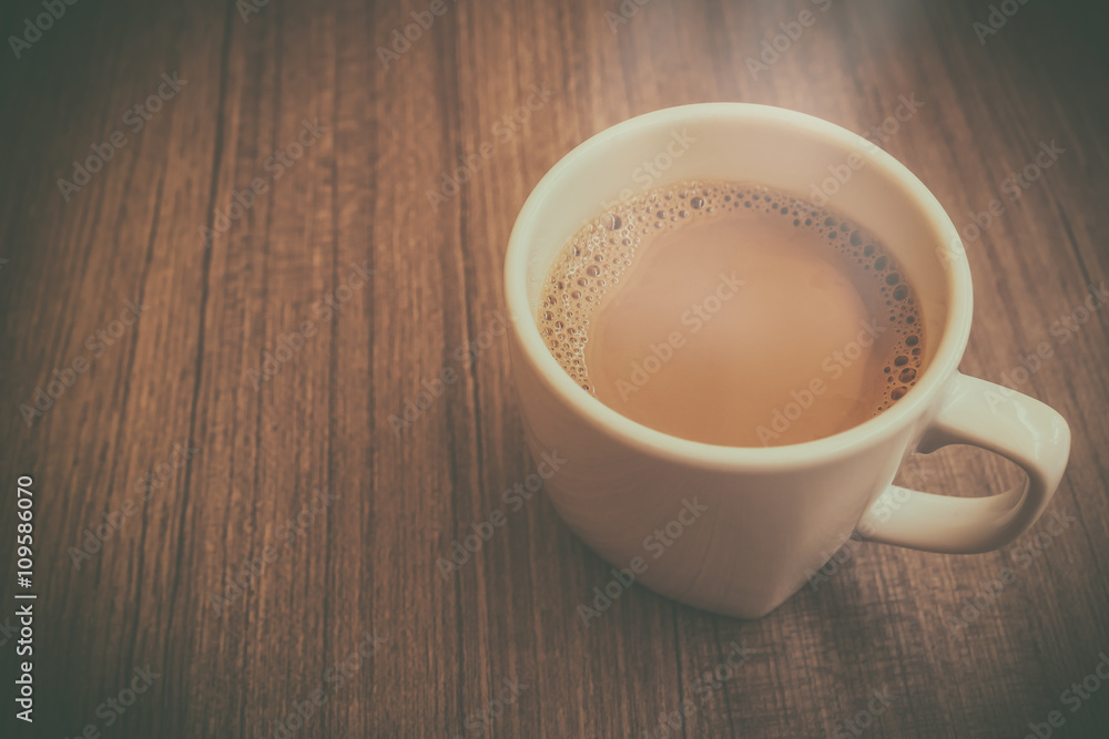 Coffee cup on wood table Coffee cup on wood table
