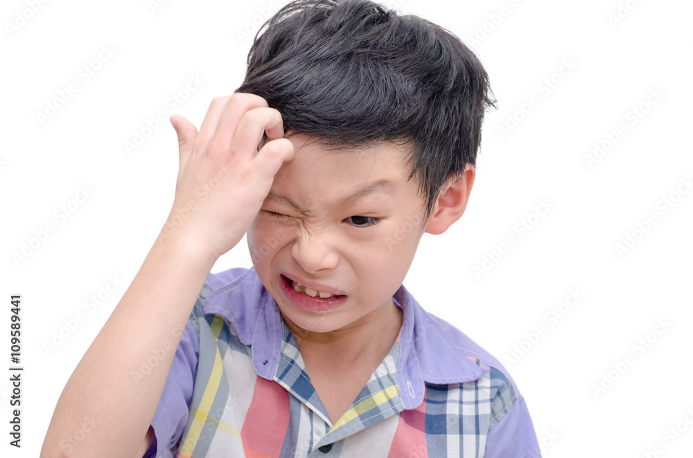 Young Asian boy scratching his scalp over white Young Asian boy scratching his scalp over white