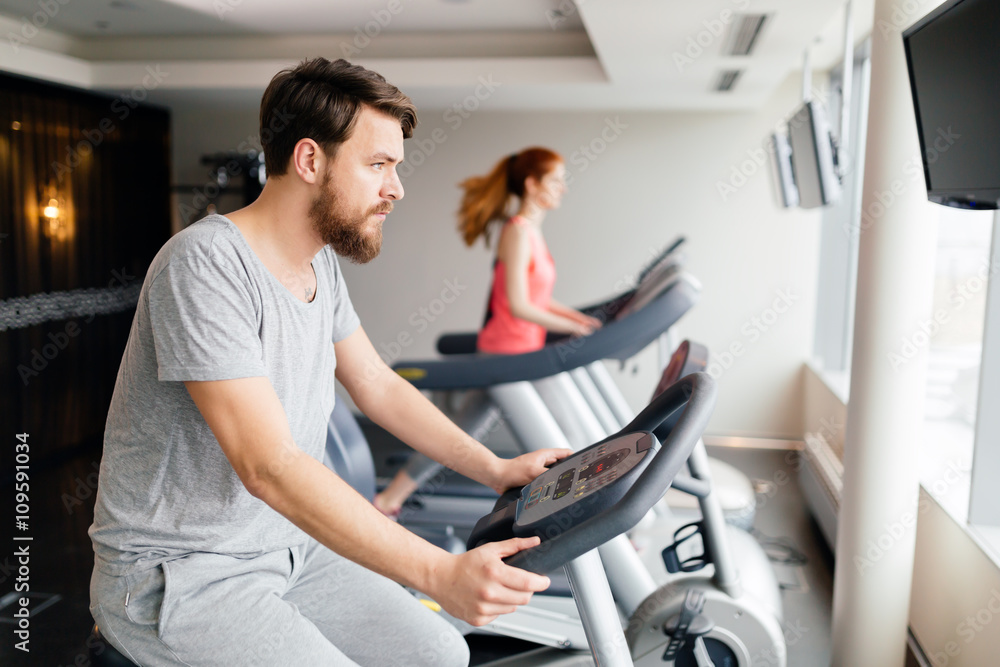 Man cardio training on a bicycle Man cardio training on a bicycle
