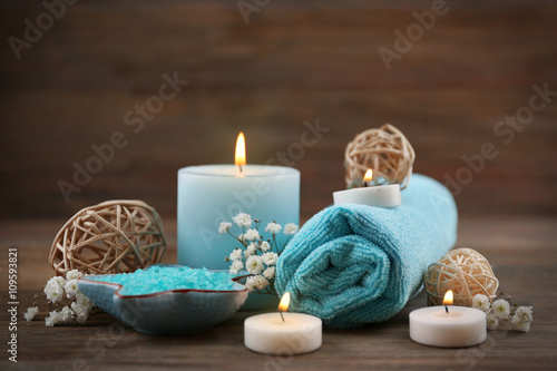 Spa still life in light blue color on wooden background