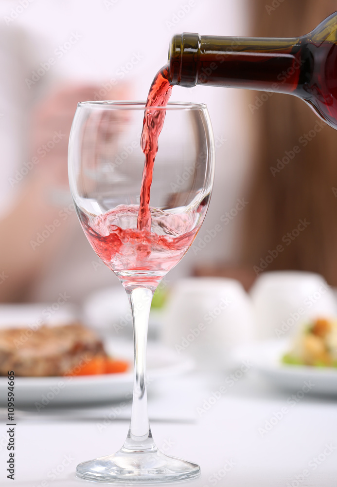 Naklejka premium Dinner with wine in restaurant