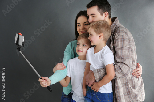 Happy family making selfie ...