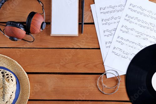 Headphones, music sheets an...