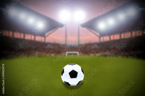 Soccer Ball On Green Field of football stadium and stadium arena © tuiphotoengineer