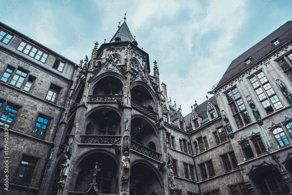 Fototapeta premium Old gothic style tower above building