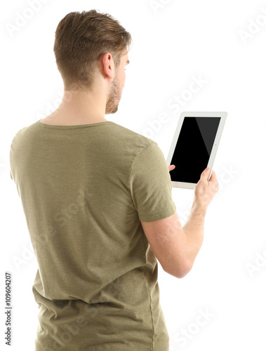Young man using tablet, iso...