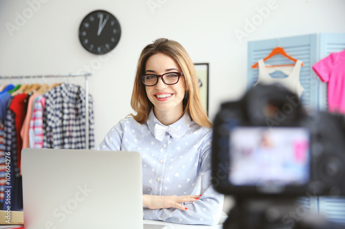 Young female blogger with l...