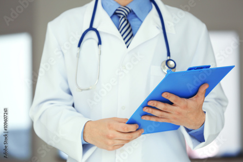 A male doctor standing in the hospital, close-up