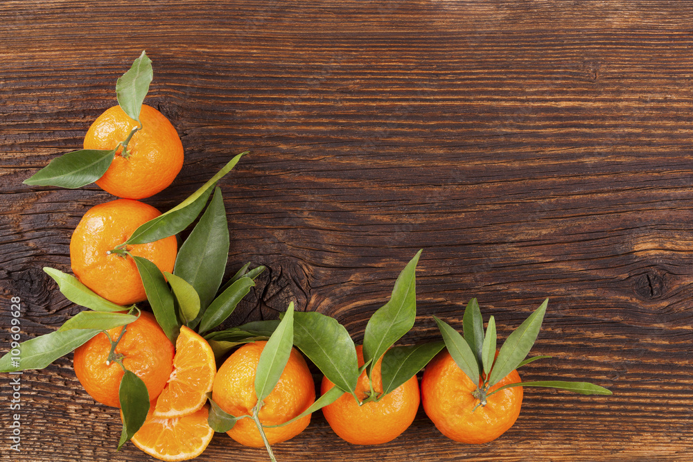 Fresh ripe mandarines on wooden table. Fresh ripe mandarines on wooden table.