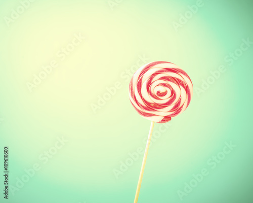 Lollipop on blue background with copy space.,Pastel tone.