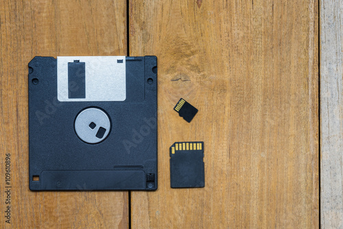 Diskette ,SD card, Micro SD card and memory were put together on wood board