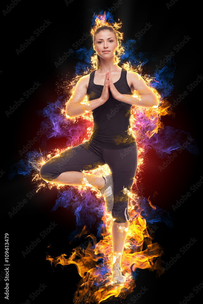 MMA woman fighter tough chick boxer punch pose pretty exercise training cross fit athlete. With fire background