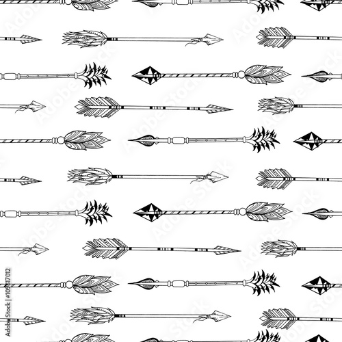 Vector pattern of ancient arrows. Hipster trendy seamless pattern. Hand drawn black and white isolated trendy bohemian illustration. Use for closes, wallpaper, gretting card, fashion.