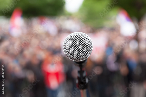 Political protest. Public demonstration. Microphone. © wellphoto