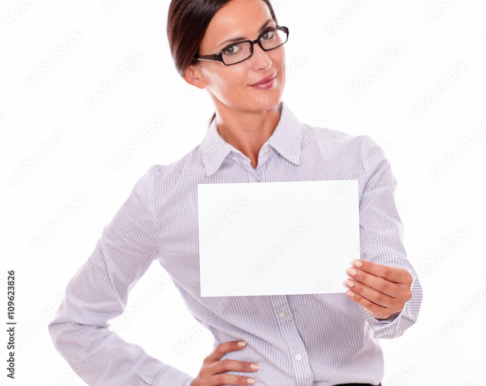 Smiling businesswoman with a blank signboard Smiling businesswoman with a blank signboard