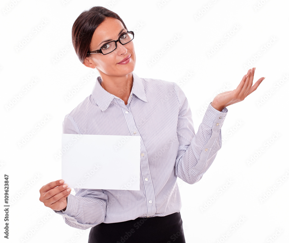 Impassive brunette businesswoman with a signboard Impassive brunette businesswoman with a signboard
