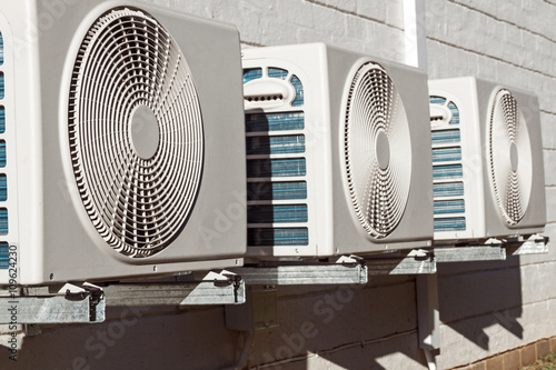 Newly Installed Airconditioning Units Mounted on Brick Wall