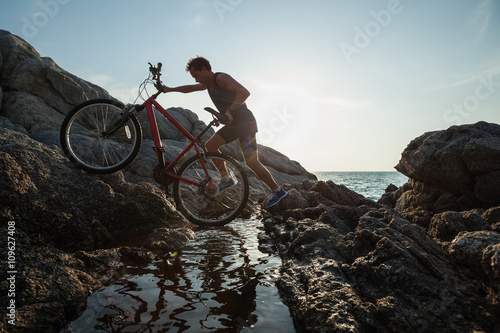 Fototapeta Naklejka Na Ścianę i Meble -  Man with bicycle